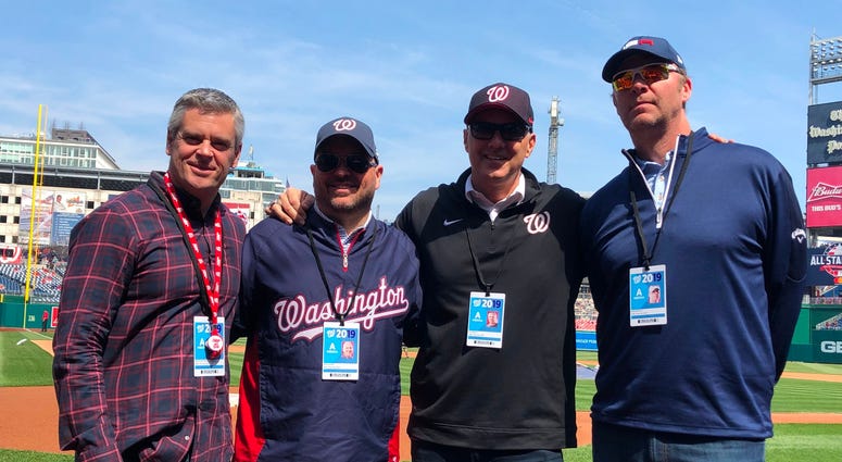 The Sports Junkies on the field at Nationals Park. The Sports Junkies on the field at Nationals Park.