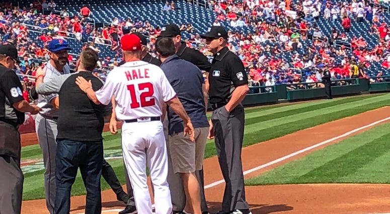 Grant Paulsen and Danny Rouhier exchange lineup cards at Nats Park. Grant Paulsen and Danny Rouhier exchange lineup cards at Nats Park.
