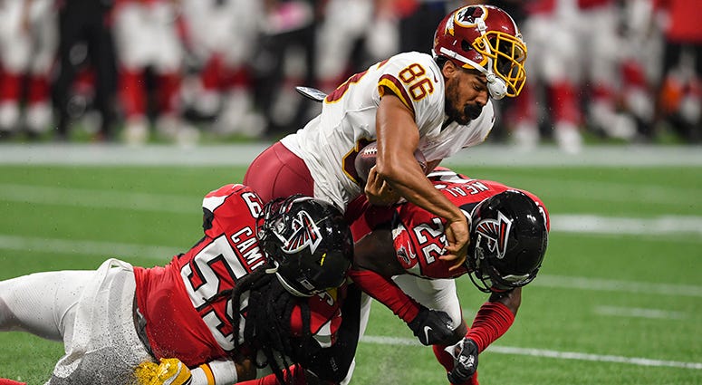 Jordan Reed in concussion protocol after helmet-to-helmet hit Jordan Reed being evaluated for a concussion
