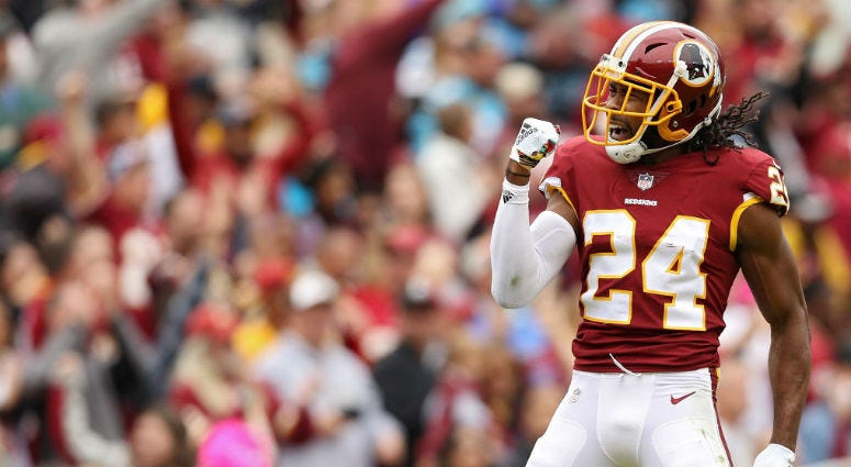 Question 5: How will cornerback battle shake out? Redskins CB Josh Norman celebrates during a game against the Panthers.