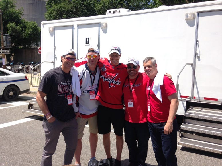 The Junks reunite with radio pal Jay Beagle after the parade Junkies_Jay_Beagle_Caps_Parade