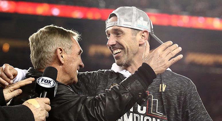 Mike Shanahan celebrates with his son Kyle Shanahan and the 49ers Super Bowl berth Shanahans one win away from total Redskins vindication