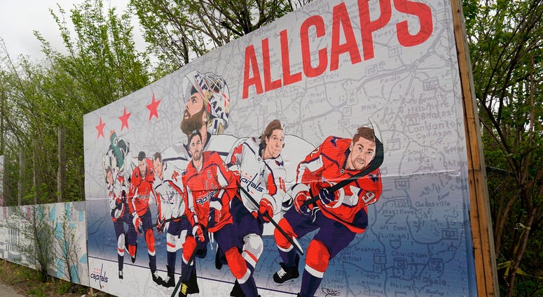 Caps mural at 1800 Martin Luther King Jr Ave SE Washington, DC, designed by Robert Generette III MLK_Ave_Mural
