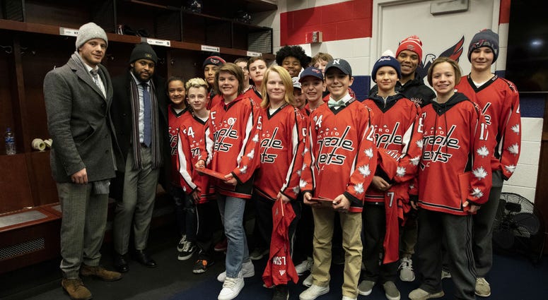 13-year-old Divyne Apollon II and his Metro Maple Leafs teammates meet the Washington Capitals Capitals unite around youth hockey team to combat 'ugliness' of racism
