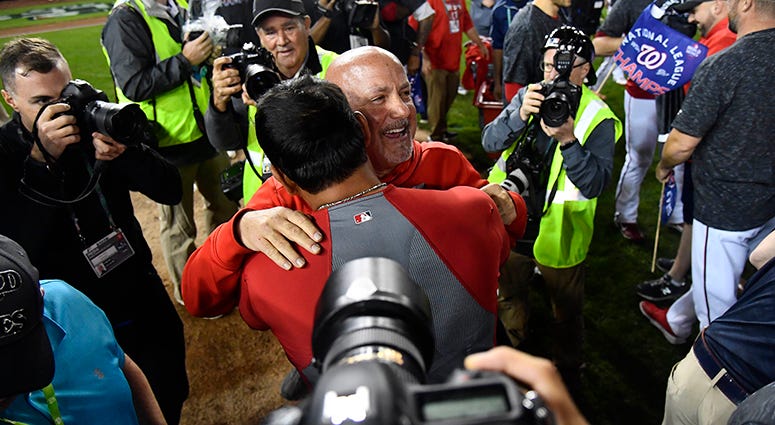 Nationals General Manager Mike Rizzo and Manager Dave Martinez celebrate winning the National League pennant Mike Rizzo Dave Martinez