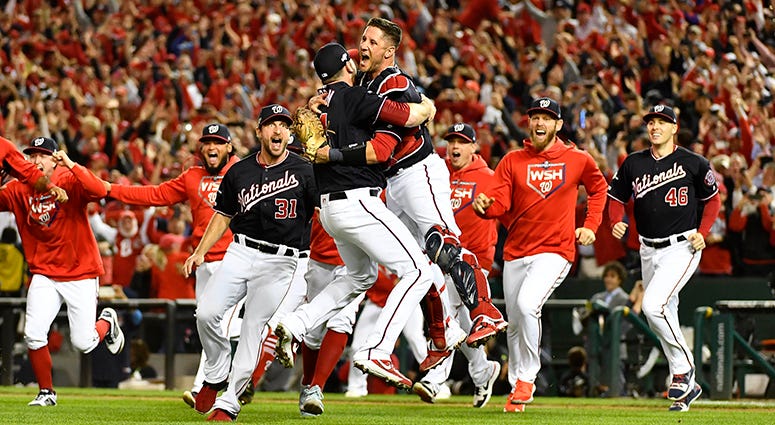 The Nationals rush the feed to celebrate their NLCS victory over the Cardinals and the first World Series appearance in franchise history Nationals Celebrate NLCS Victory