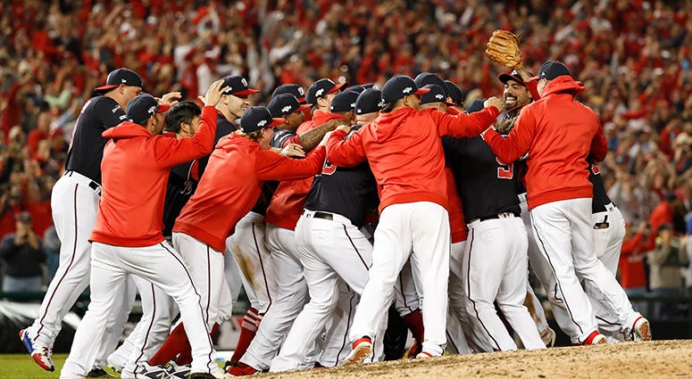 Nationals rush the field to celebrate winning the National League pennant Nationals Win NLCS