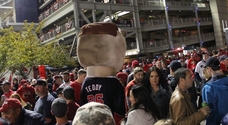 We think Teddy had to tinkle. One of the Racing President's walking the concourse at Nationals Park during Game 4 of the World Series.