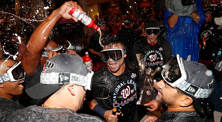The Nationals celebrate winning the NL pennant in the clubhouse Nationals NLCS championship celebration