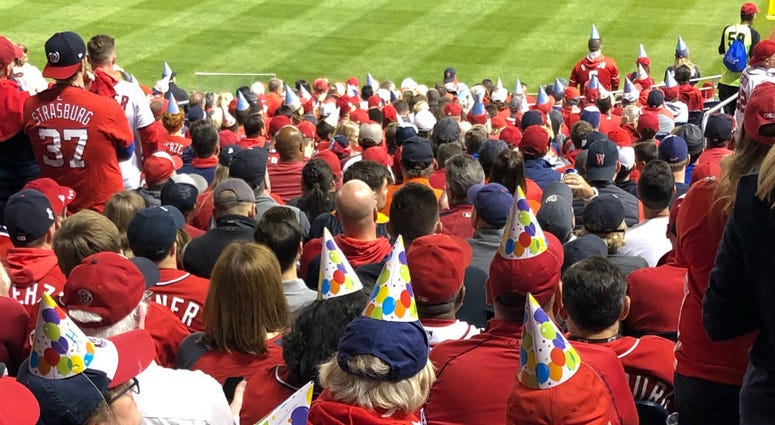 Nationals fans wear birthday hats for Juan Soto at Game 3 of the World Series at Nats Park. Nationals fans wear birthday hats for Juan Soto at Game 3 of the World Series at Nats Park.