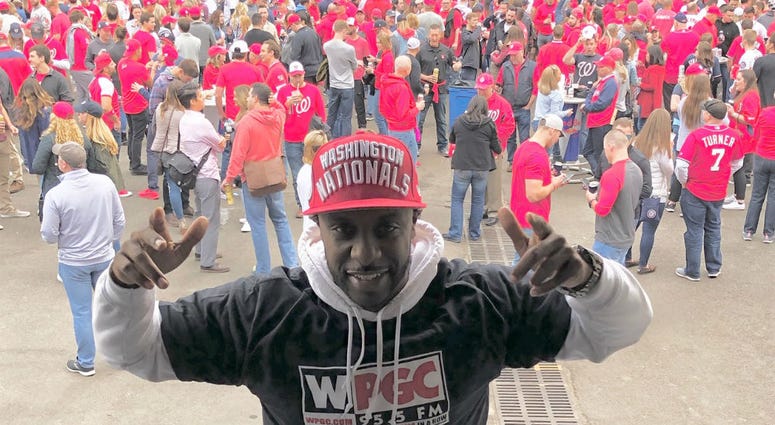 A sea of red behind WPGC's DJ AKADEMIKS during Game 3 pregame before the World Series at Nationals Park. A sea of red behind WPGC's DJ AKADEMIKS during Game 3 pregame before the World Series at Nationals Park.