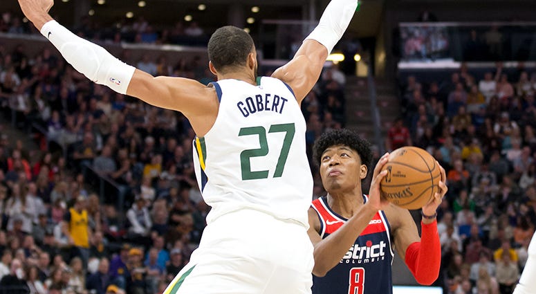 Utah Jazz center Rudy Gobert, who tested positive for Coronavirus, defends against Wizards forward Rui Hachimura in a February 28th game Wizards players, staff self-quarantine for coronavirus