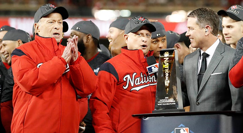 Nationals owners Ted Lerner (left) and Mark Lerner (right) celebrate the National League pennant Ted Lerner