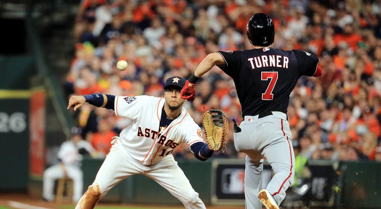 Trea Turner was called out on this play in Game 6 of the World Series. Best pictures of World Series umpire controversy, Dave Martinez ejection