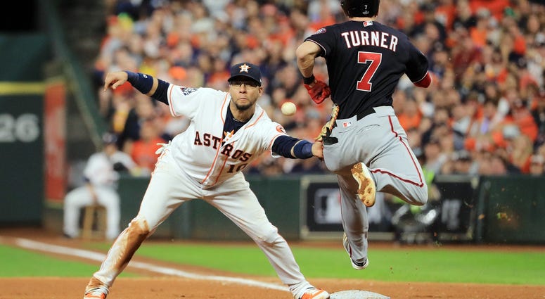 Trea Turner was called out on this play in Game 6 of the World Series. Best pictures of World Series umpire controversy, Dave Martinez ejection