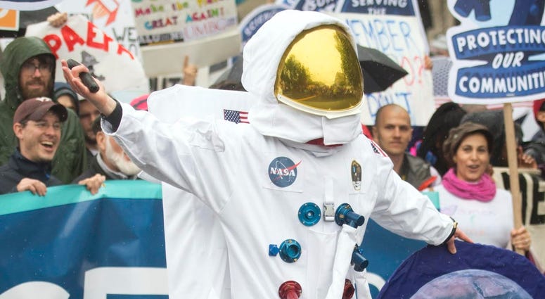 Guy in an astronaut costume astronaut_costume