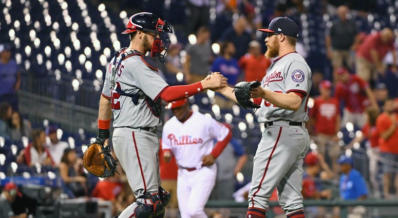 Sean Doolittle and Matt Wieters celebrate a win. Nationals_Win