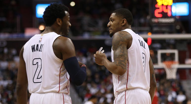 John Wall confers with Bradley Beal in Game 3 against Toronto John_Wall_Bradley_Beal