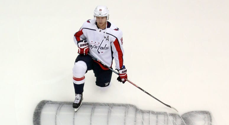 Nicklas Backstrom stretches on the ice ahead of Game 3 Nicklas_Backstrom