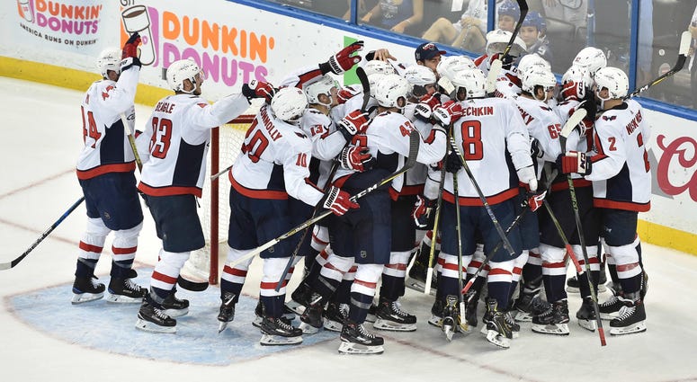 Players celebrate after Eastern Conference Finals win. caps_capitals_celebrate