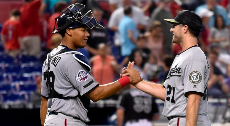 Pedro Severino celebrates a victory with Brandon Kintzler Brandon_Kintzler_Pedro_Severino