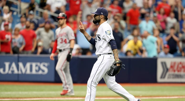 Ray reliever Sergio Romo jaws at Nats outfielder Michael A. Taylor after recording the final out Sergio_Romo_Nationals_Rays
