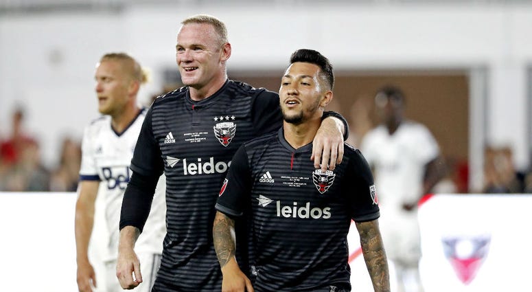 D.C. United's Wayne Rooney and Luciano Acosta. Wayne_Rooney_DCUnited