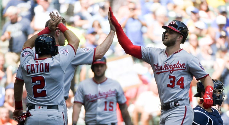 Bryce Harper celebrates a homer with teammates Adam_Eaton_Bryce_Harper