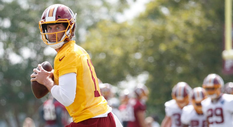 Alex Smith winds up for a long bomb at Redskins training camp Alex_Smith_Redskins_Training_Camp