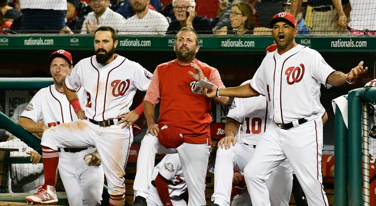 The Nationals dugout reacts to a call. Nationals_Dugout