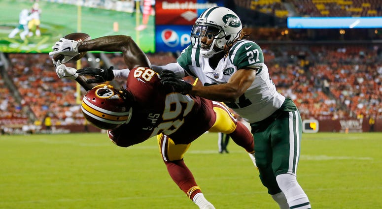 Cam Sims attempts to catch a pass in the preseason against the Jets Cam_Sims_Redskins