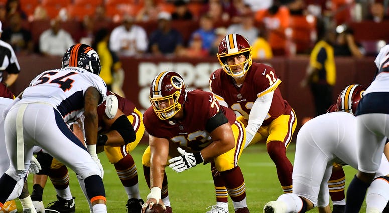 Alex Smith surveys the field during the Redskins' preseason game against the Denver Broncos. Alex_Smith_Broncos