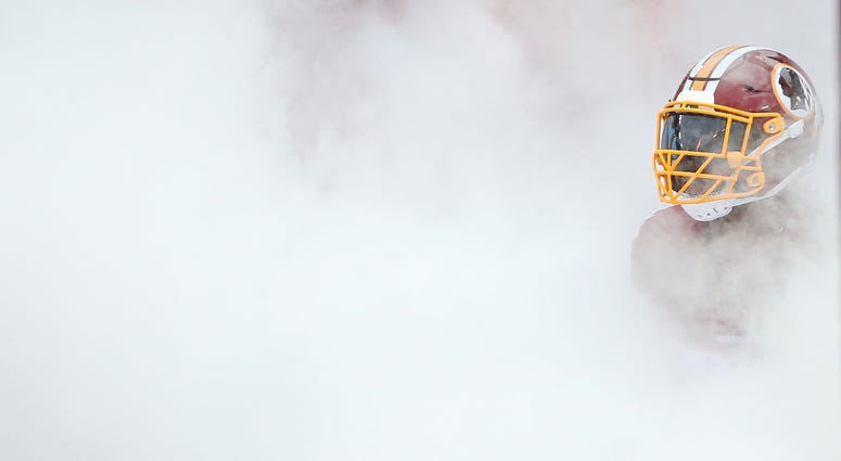 Josh Norman runs onto the field prior to a game against the Packers Josh_Norman_Redskins