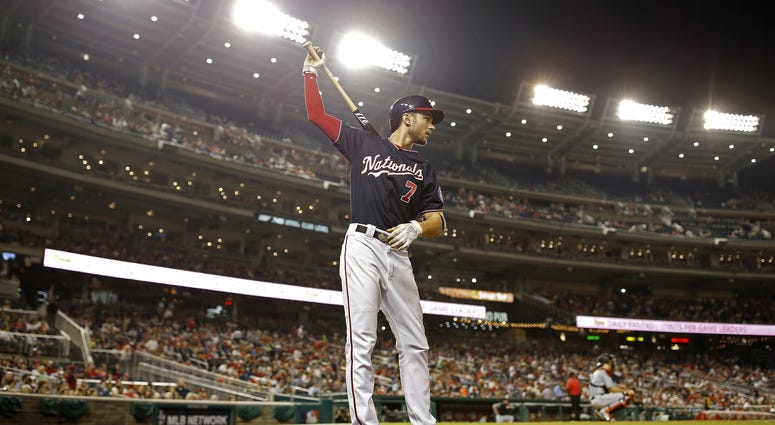 Trea Turner warms up in the on-deck circle Trea_Turner_Nationals