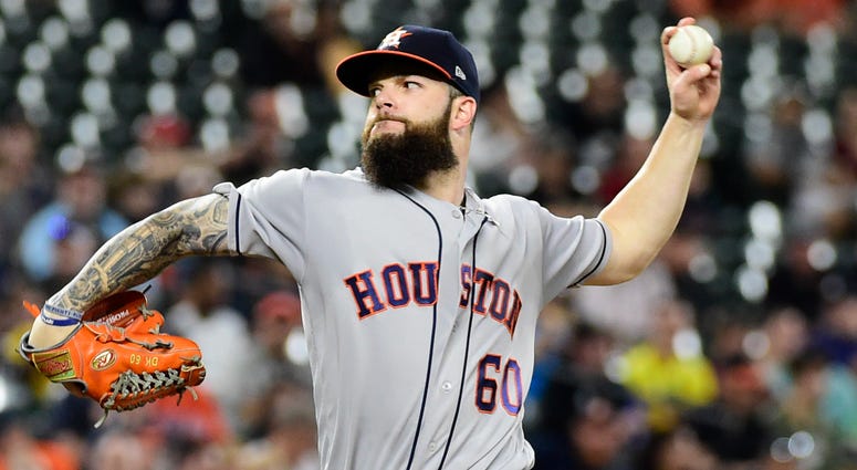 Dallas Keuchel pitches for the Houston Astros. https://thefandc.radio.com/danny-rouhier-comes-back-florida-without-voice