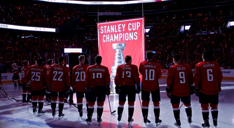 The Capitals watch as the Stanley Cup championship banner is raised. Capitals_Banner_Raising