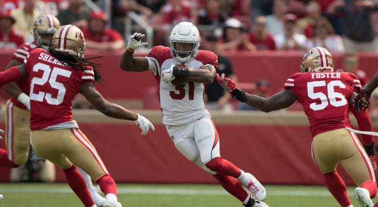 Reuben Foster and Richard Sherman close in on David Johnson Reuben_Foster
