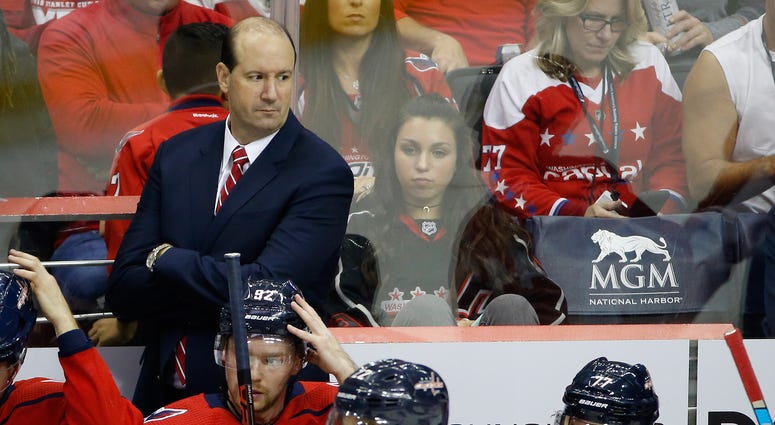 Capitals coach Todd Reirden looks on from behind the bench in the home-opener against Boston Capitals_coach_Todd_Reirden