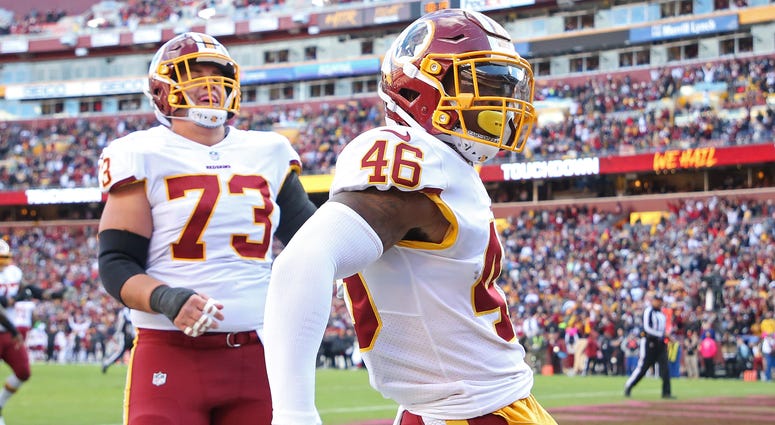 Kapri Bibbs celebrates after scoring a touchdown against the Cowboys in Dec. 2018 Packers claim Kapri Bibbs off waivers from Redskins
