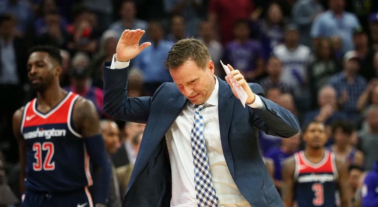 Wizards coach Scott Brooks reacts in disgust. Wizards_coach_Brooks