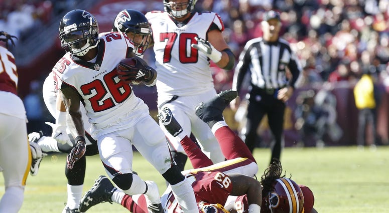 Falcons running back Tevin Coleman runs for a touchdown against the Redskins Redskins_Falcons