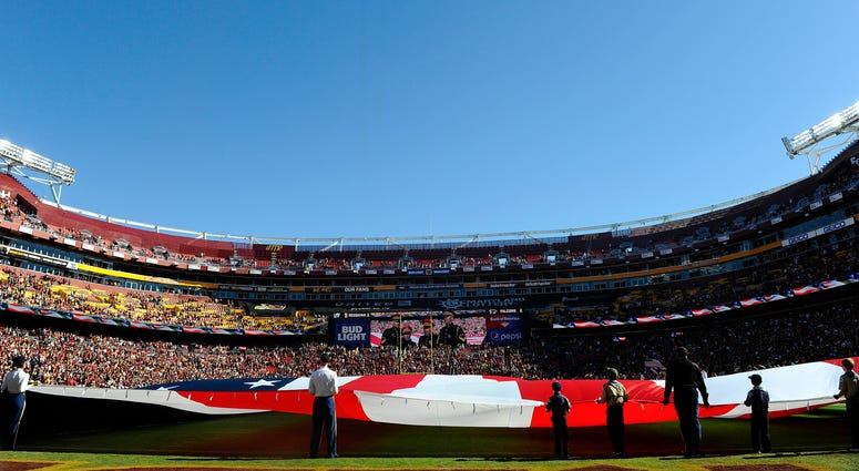 Military jets fly over FedEx Field before a Redskins game. FedEx_Field_Flyover