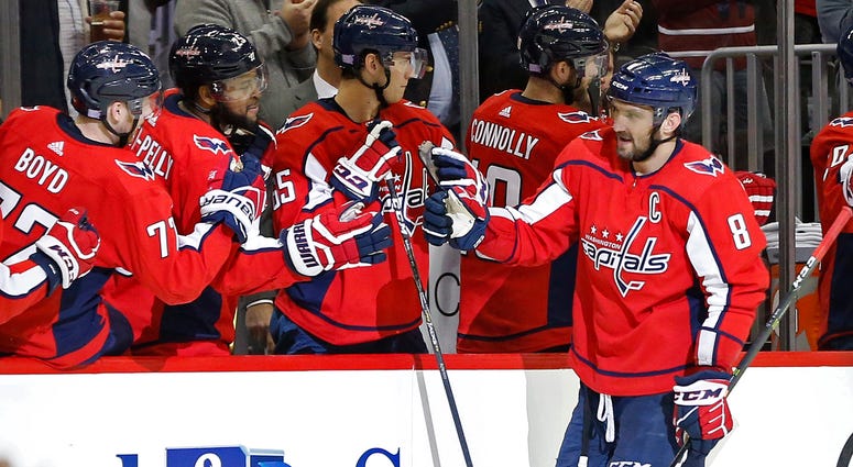 Alex Ovechkin celebrates a goal with teammates. Capitals_Goal_Ovechkin