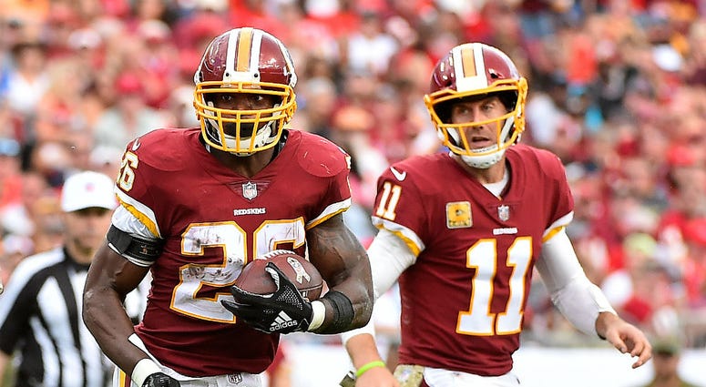 Redskins QB Alex Smith and Adrian Peterson. Redskins_Peterson_Smith