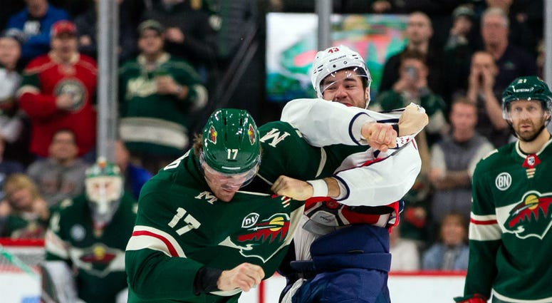 Caps forward Tom Wilson fights a Wild player. Caps_Tom_Wilson