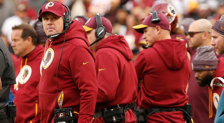 Jay Gruden and his coaching staff look on from the Redskins sideline Jay_Gruden_Redskins