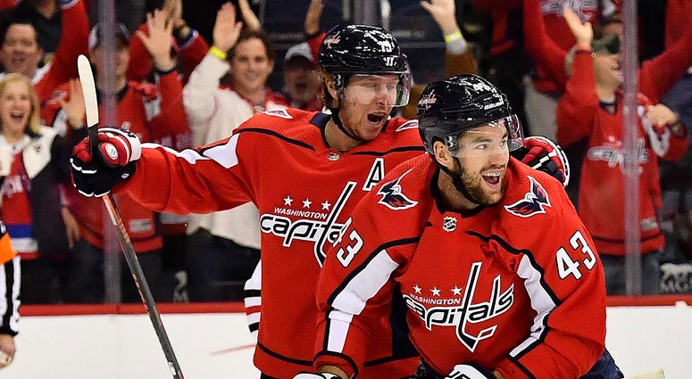 Tom Wilson celebrates with Nicklas Backstrom after scoring a first-period goal against the Blackhawks Tom_Wilson_Capitals