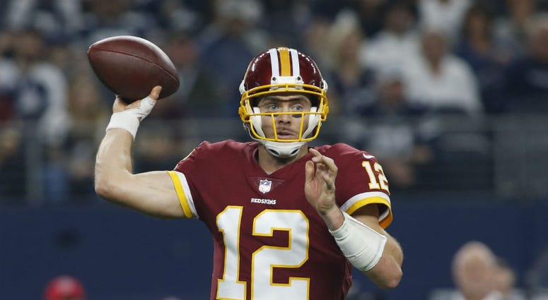 Redskins QB Colt McCoy throws a pass against Dallas. Colt_McCoy_Redskins