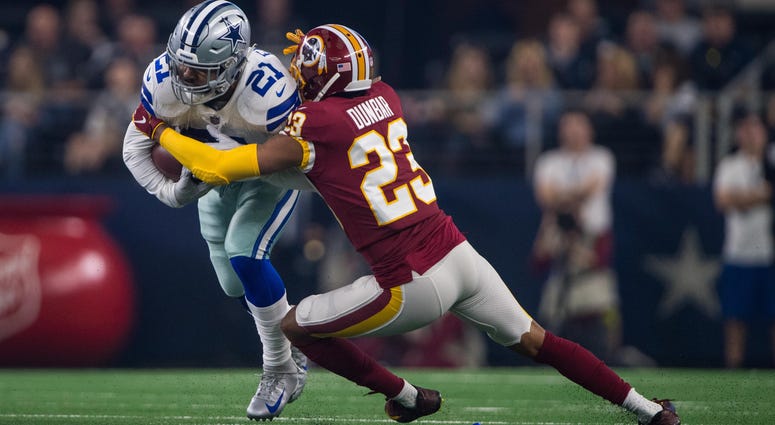 Quinton Dunbar tackles Ezekiel Elliott. Quinton_Dunbar_Tackle