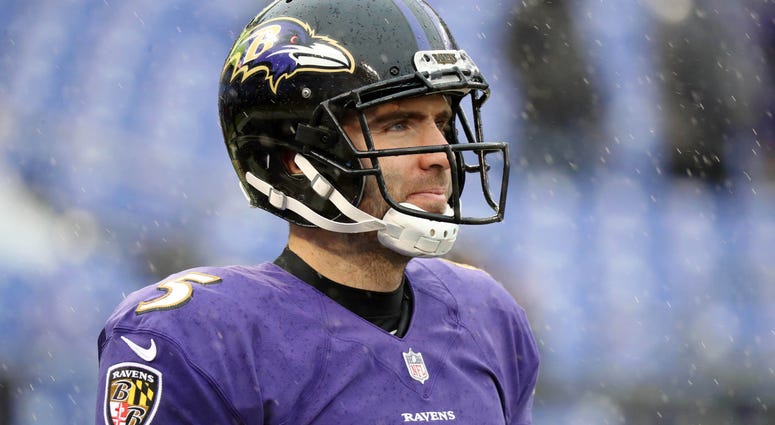 Flacco warms up in the rain prior to his first career game as a backup Craig Hoffman: Redskins' interest in Joe Flacco was overblown